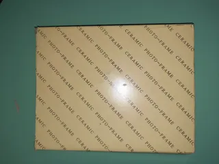 Cornice portafoto in ceramica