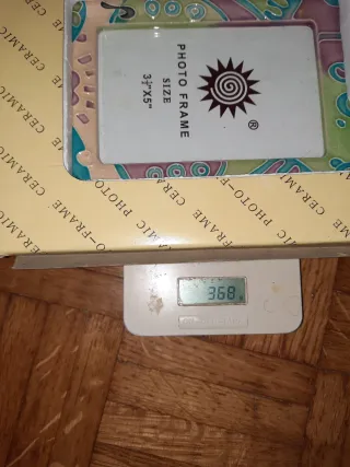 Cornice portafoto in ceramica