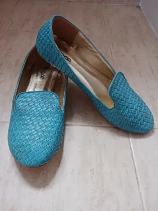 Zapatos planos azules tejidos