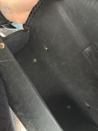 Bolso redondo cuero negro y plata