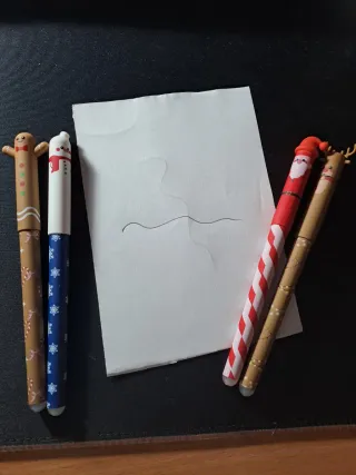 Canetas natal apagáveis