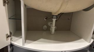 Mobile bagno con piano cristallo oro verde