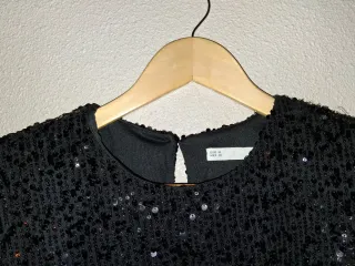 Blusón negro lentejuelas