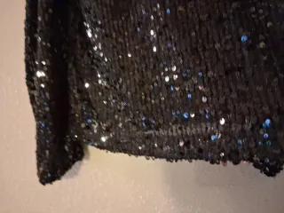 Blusón negro lentejuelas