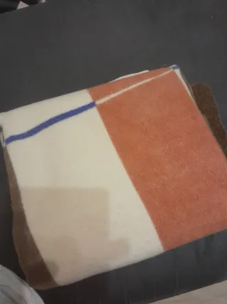 Coperta Marzotto lana arancione/beige.