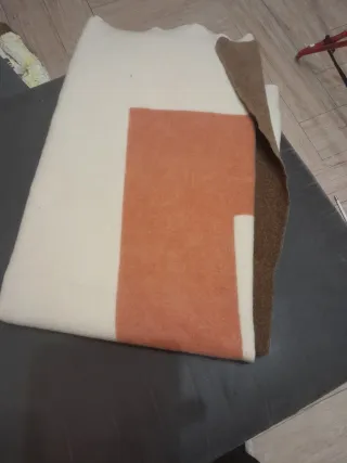 Coperta Marzotto lana arancione/beige.