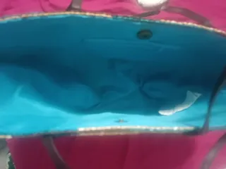 Capazo tejido marrón y turquesa