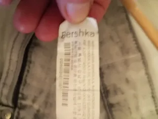 Vaqueros Bershka hombre grises