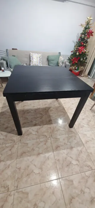 Mesa de comedor extensible de madera negra