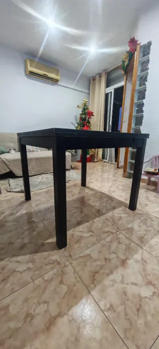 Mesa de comedor extensible de madera negra