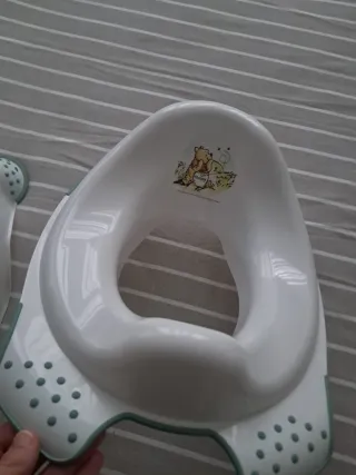 Adaptador y orinal para baño de bebé