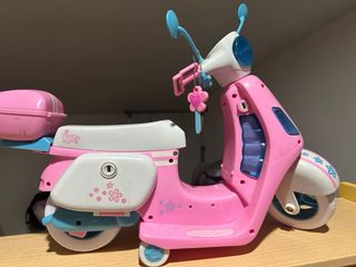 Moto Nancy con ropa y casco