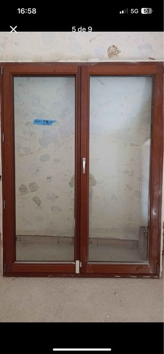 Vidriera balconera madera solapada de madrers