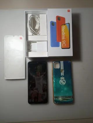 Xiaomi Redmi 9C Blu/Arancione + Accessori