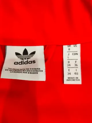 Impermeabile oversize Adidas x Fiorucci