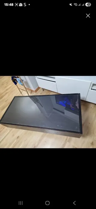 Mesa de centro de cristal negra