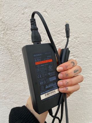 Consola PlayStation 2 nera + 1 controller