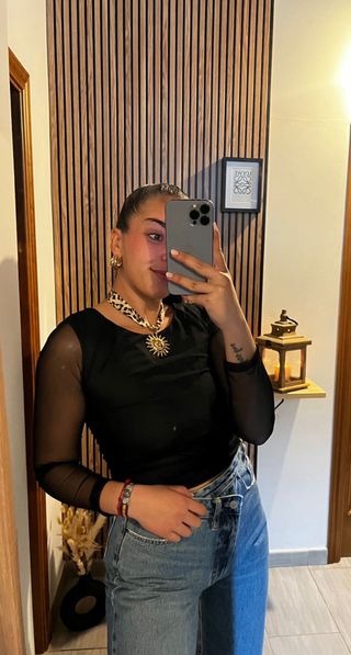 Blusa negra manga larga transparente