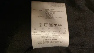 Cappottino nero con dettagli