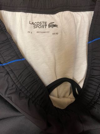 Tuta Lacoste uomo nera e blu