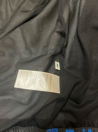 Tuta Lacoste uomo nera e blu