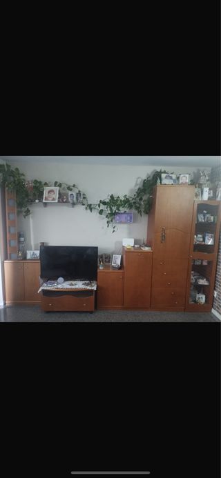 Cama alta con cajones y armarios