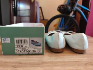 Vestido de comunión blanco con fajín verde agua