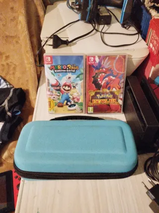 Nintendo Switch + Custodia + 3 Giochi + Archiviazione