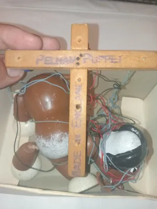 Marioneta de perro de madera