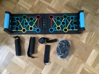 Tabla flexiones plegable con accesorios
