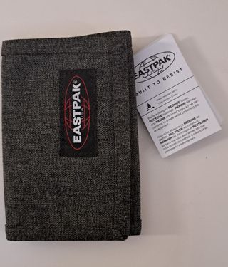 Cartera Eastpak gris