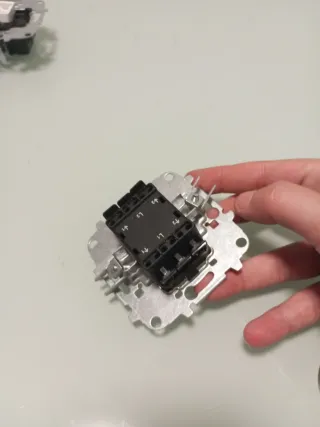 Doble conmutador Niessen Arco