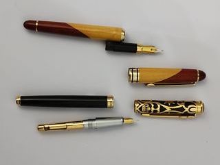 Lotto di 2 penne stilografiche: legno e metallo