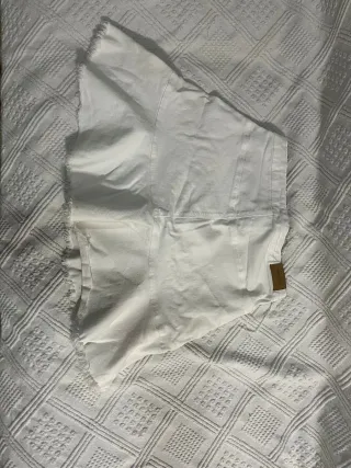 Falda vaquera blanca desgastada