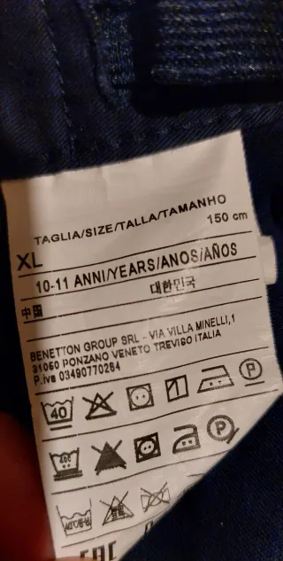 Pantalones Benetton niño azul marino.