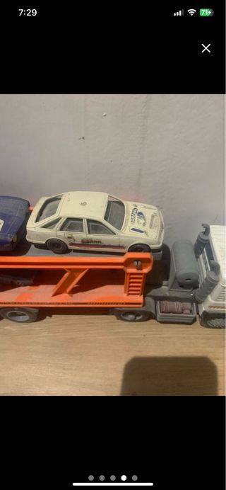 Camión porta coches con 5 coches