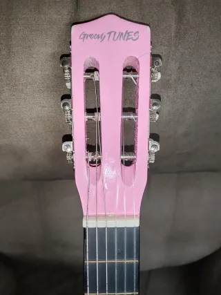Guitarra rosa infantil