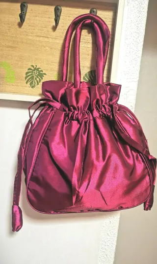 Bolso fucsia bordado flores