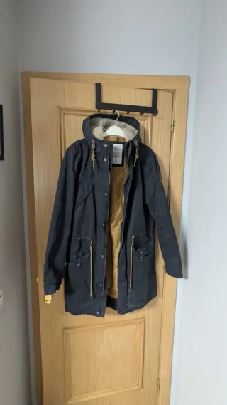 Abrigo chico negro y marrón