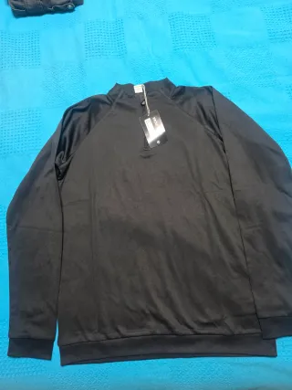 Camiseta deportiva negra Talla 14/M