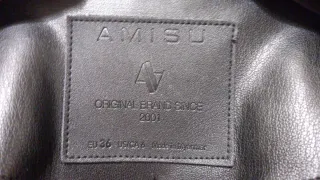 Chaqueta cazadora polipiel entallada elástica