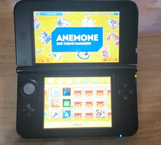 Nintendo 3DS XL Nero/Blu + Caricabatterie e Custodia