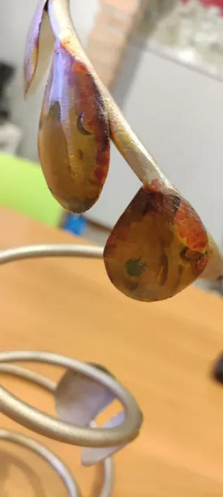 Porta bottiglie in ferro con applicazioni