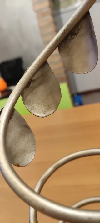 Porta bottiglie in ferro con applicazioni