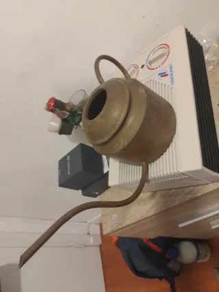 Regadera de latón antigua