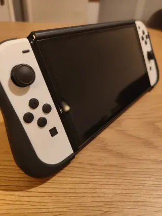 Nintendo Switch OLED + Accessori