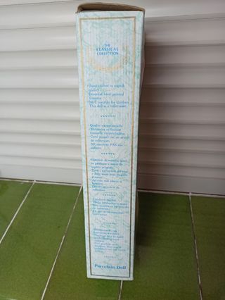 MUÑECA DE PORCELANA