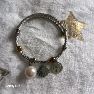 Pulsera en acero  con  perla, concha y árbol
