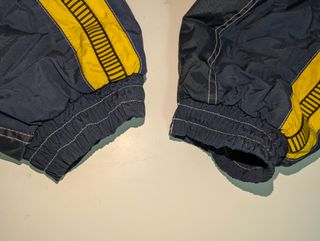 Mono de esquí BRUGI jump-jet azul y amarillo