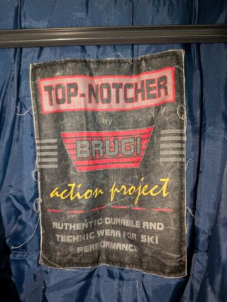 Mono de esquí BRUGI jump-jet azul y amarillo